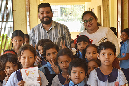 Spreading Bliss Foundation’s volunteers with school children



        