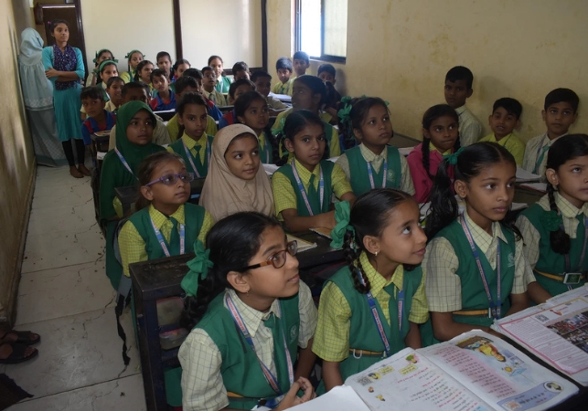 School girls attending an awareness session conducted by Spreading Bliss Foundation 

