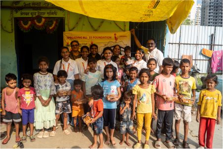  SBF Volunteers with children during food distribution 





        