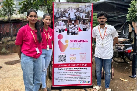 Volunteers from Spreading Bliss Foundation at a community outreach point supporting hunger relief for children and families.